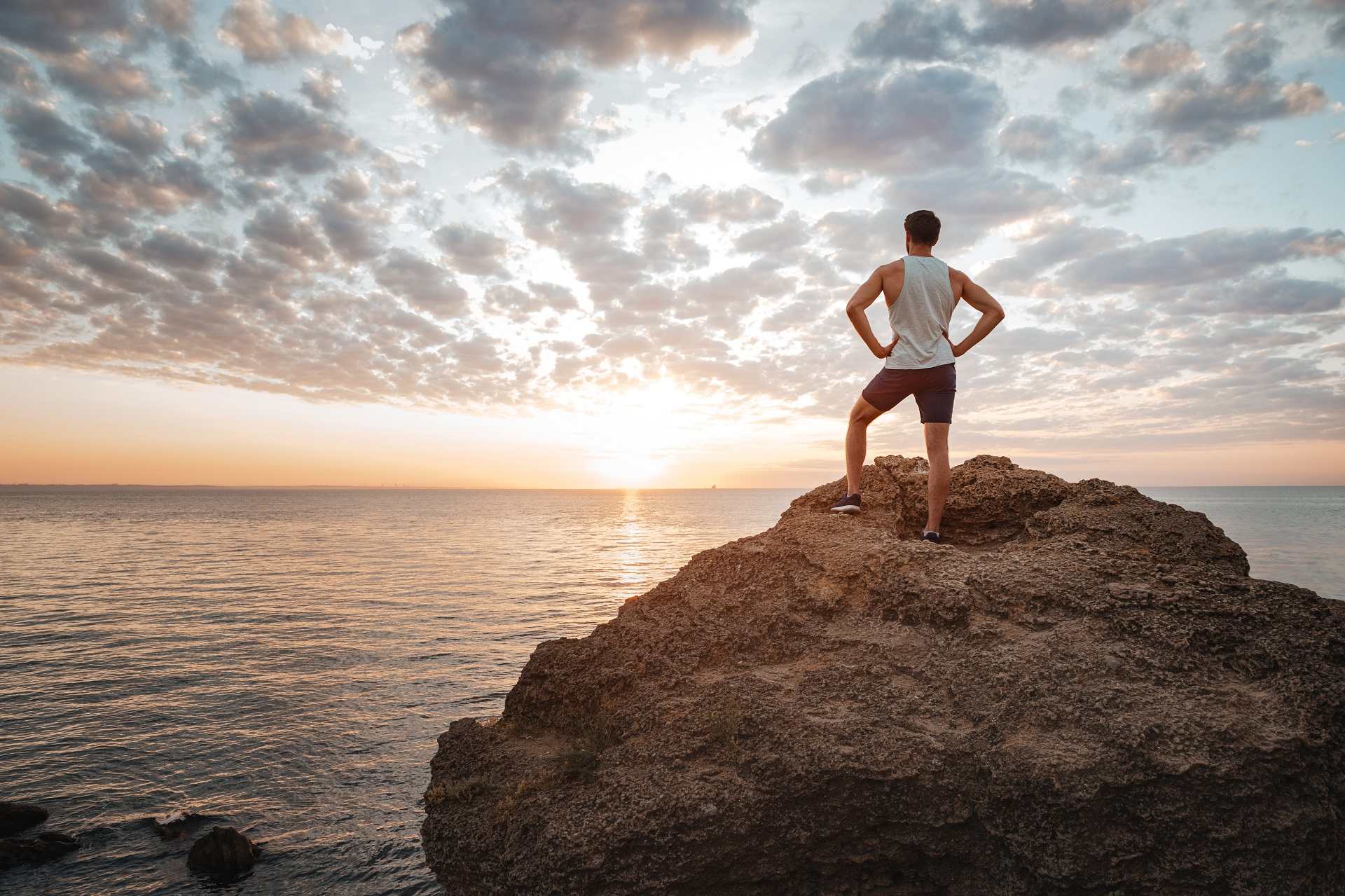 graphicstock-young-sportsman-looking-at-sunset